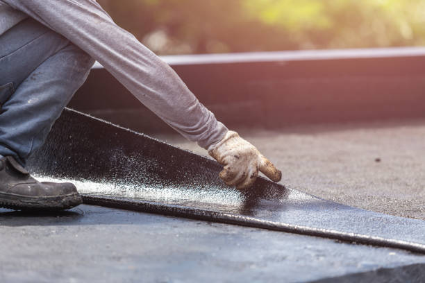 Professional Basement Waterproofing technician working in Mountain City, TN